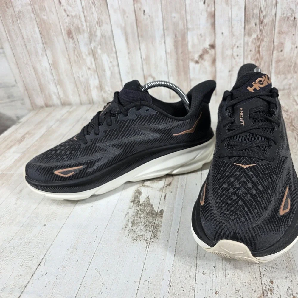 Hoka Clifton 9 Womens 9.5B Black Rose Gold Running Shoes 1127896-BRGL Sneaker
